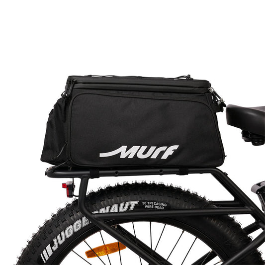 Black bicycle bag with 'Murf' branding attached to a bike tire.