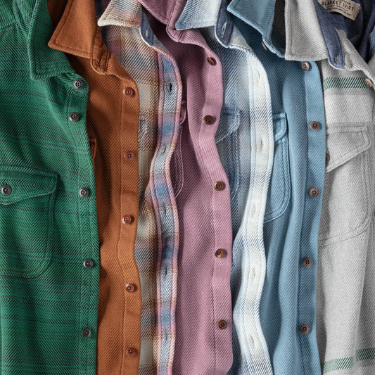 Stack of various colored blanket shirts.