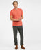 Coral pocket crew-neck tee worn by man with dark pants