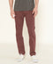 Redwood tapered jeans on model, slim leg with cuffed hem and side seams