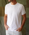 Man wearing bright plain white t-shirt 