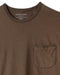 A brown crew-neck t-shirt with a front pocket, made from Peruvian Pima cotton.