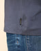 Men's storm-blue tee hem with OUTERKNOWN label