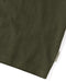 Closeup of 'Outerknown' tag on seem of olive green short sleeve t-shirt