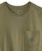 Close-up of the olive tee's crew neck, label, and logo pocket