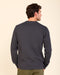Back view long-sleeve crewneck tee in washed black, ribbed cuffs and hem