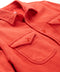 Vermillion fabric button placket and chest pocket details on blanket-style shirt