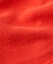 Vermillion woven blanket fabric close-up with fine textured knit pattern