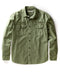 A green, long-sleeved utilitarian shirt with a herringbone texture and chest pockets.