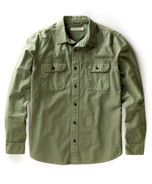 A green, long-sleeved utilitarian shirt with a herringbone texture and chest pockets.