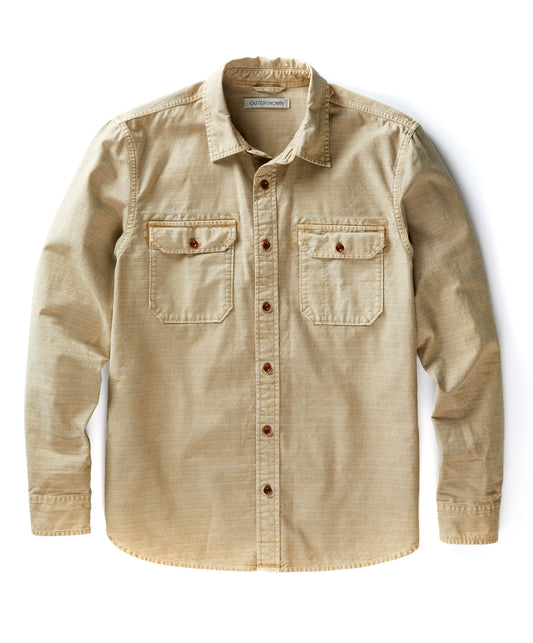 A long-sleeved, button-up, beige utilitarian shirt with chest pockets.