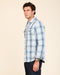 Light blue plaid button-up shirt with long sleeves and chest pockets, side profile