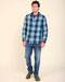 Men's blue plaid blanket shirt with snap front and two chest pockets