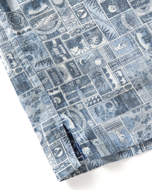 Closeup of seem with blue patterned button down