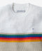 Outerworn nostalgic sweater chest close-up: textured knit, rainbow stripe