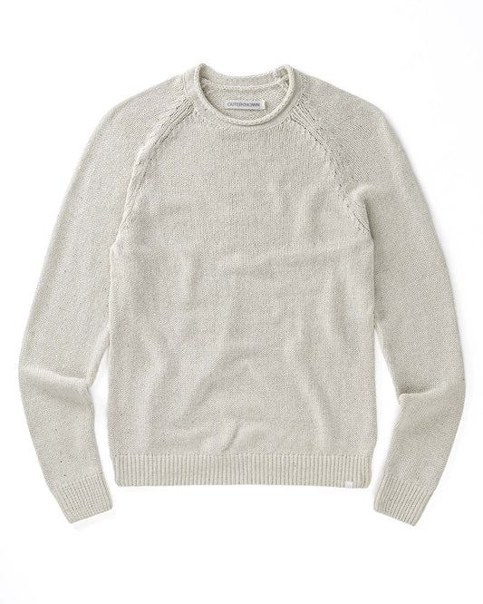 Light beige sweater on a white background