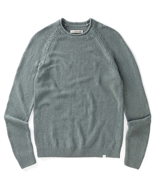 Green sweater on a white background