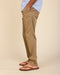 Men's chestnut stretch chinos, side view with button-front and slanted pockets