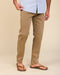 Men's chestnut stretch chino pants, seated crease and cuffed hems in view