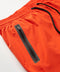 Stretch volley shorts detail showing black zipper pocket and drawstring cord