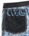 Closeup of pocket liner of blue patterned boardshorts