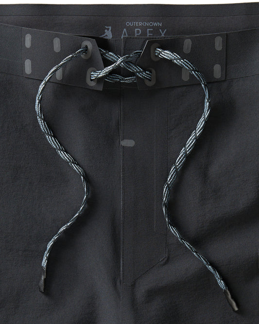 Black boardshorts with a drawstring waist, featuring a soft touch interior waistband, gusseted fly, and reinforced ultrasonic-welded seams.