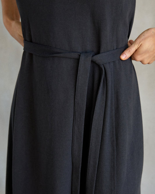 Closeup of waist line with a strap on dress