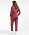 Outerworn plum station jumpsuit back view with long sleeves and gathered waist
