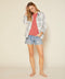 Gray and white plaid button-front shirt with chest pockets, shown worn open.