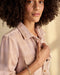 Women’s blanket shirt detail: lilac plaid collar, button placket, flap chest pocket