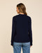 Back view of navy knit crewneck sweater with ribbed hem and cuffs