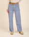 Light blue corduroy pants with belt loops, front patch pockets, and relaxed straight legs