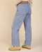 Light blue corduroy pants with side cargo pocket and wide straight-leg fit