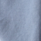 Close-up of a textured blue fabric surface