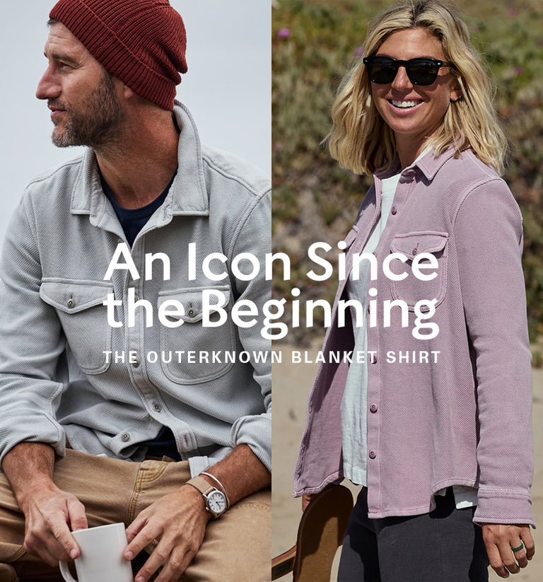 Two people wearing The Outerknown blanket shirt with text 'An Icon Since the Beginning' on a blurred background.