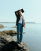 Washed marine corduroy pants with straight legs, front pockets, and button fly