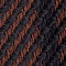 Close-up of a woven fabric with a black and brown pattern
