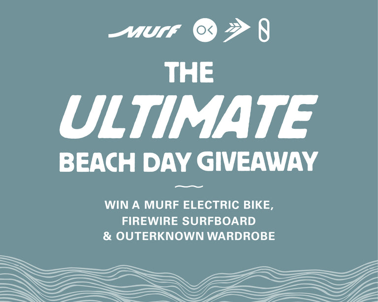 Promotional image for a beach day giveaway featuring a bike and a person sitting on a bike.