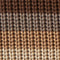 Close-up of a woven fabric with brown and beige pattern