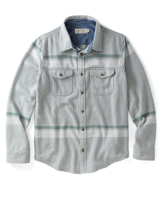 Gray flannel shirt with blue accents on a white background
