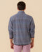 Outerworn French Blue snap popover, back view with stand collar and yoke seams