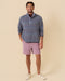 Outerworn French Blue snap popover, model front view with chest logo patch