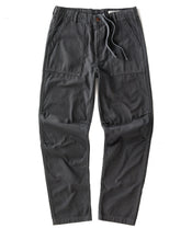 Dark gray pants with multiple pockets on a white background
