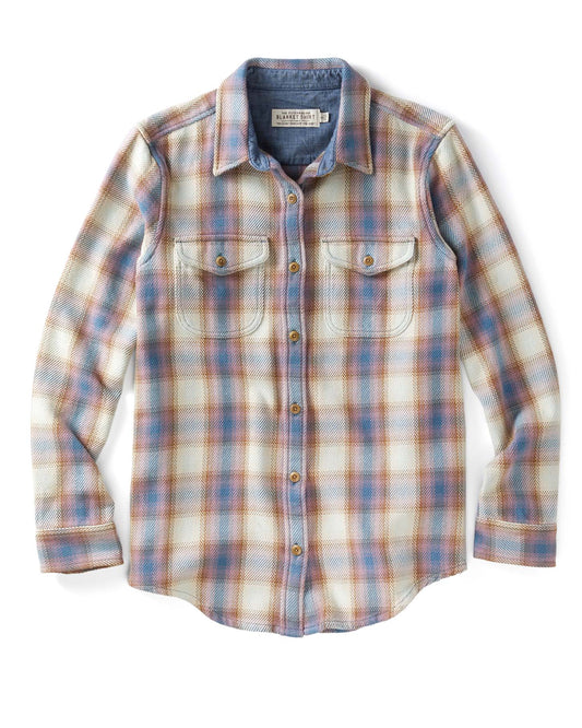 Plaid shirt with a visible brand label on a white background