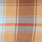 Tan plaid fabric swatch with light blue and orange crosshatch lines