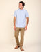 Light blue short-sleeve oxford button-up shirt with button front and chest pocket