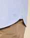 Light blue oxford shirt with logo on hem and curved side seam detail